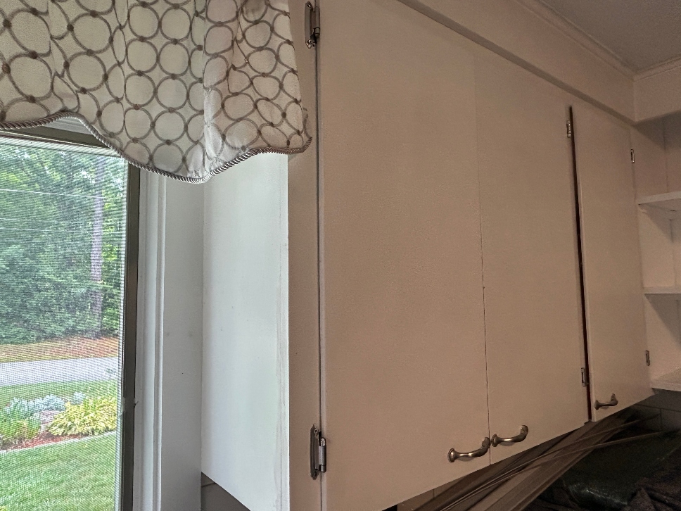 After cabinet painting in Ludlow MA — professionally spray-painted kitchen cabinets with fresh color