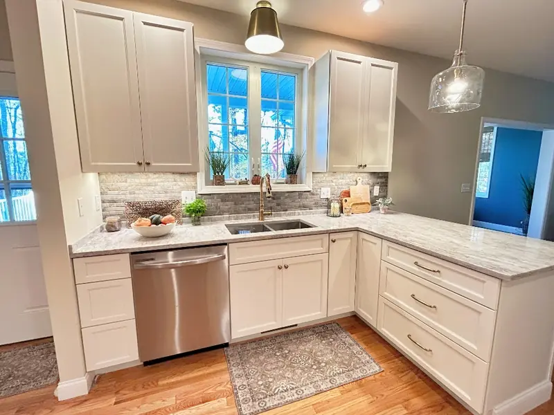 White painted MDF shaker doors for cabinet refacing in Massachusetts kitchen