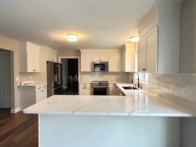 Cabinet refacing completed in Ludlow Massachusetts with new door fronts and updated countertop
