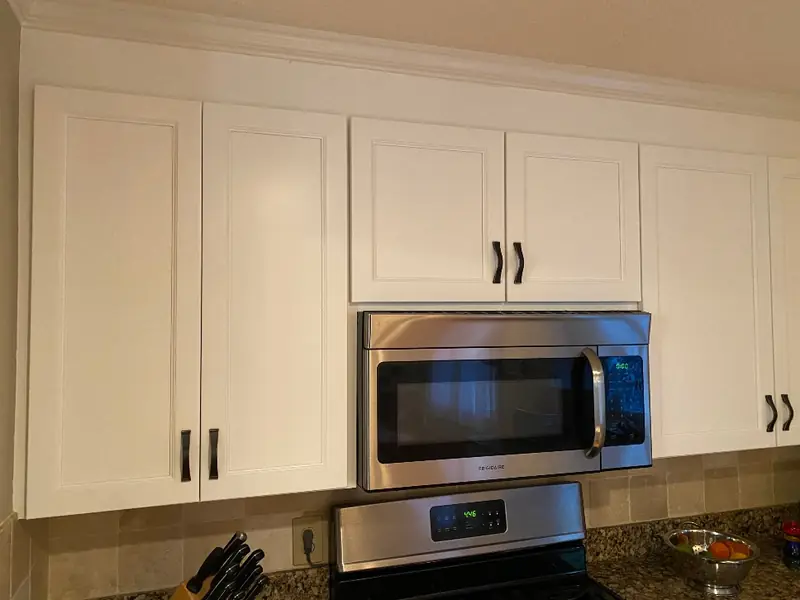 Kitchen cabinet refacing project completed in Wilbraham Massachusetts with white painted doors