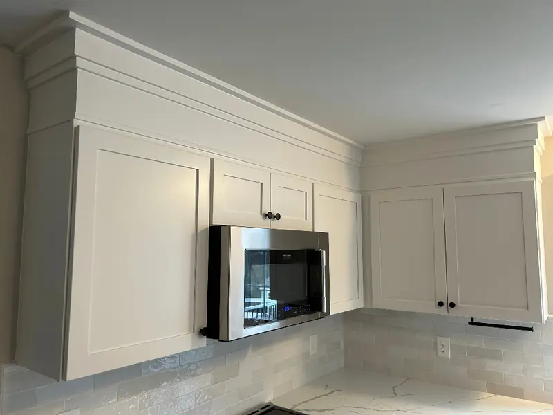 Cabinet soffit closed to the ceiling and finished with crown molding — Homestead Cabinet Design Palmer MA