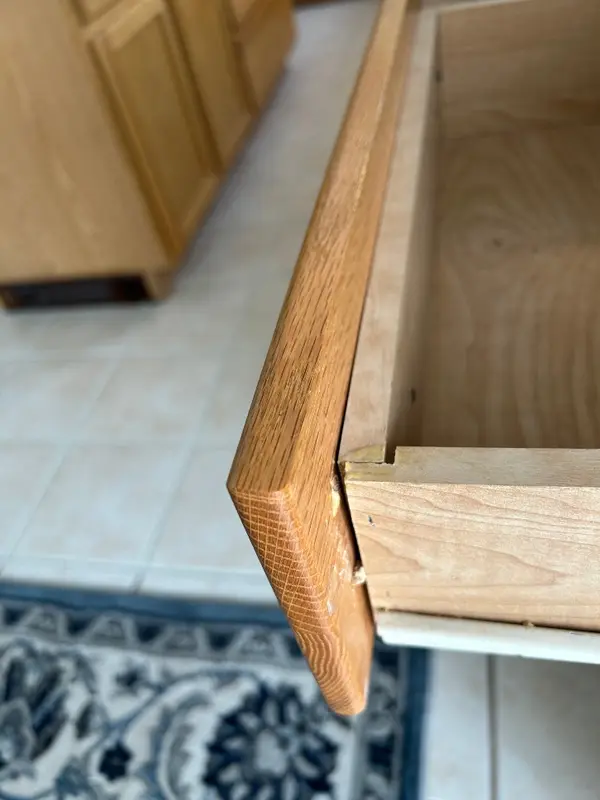 Particleboard drawer box separating at the corner joint