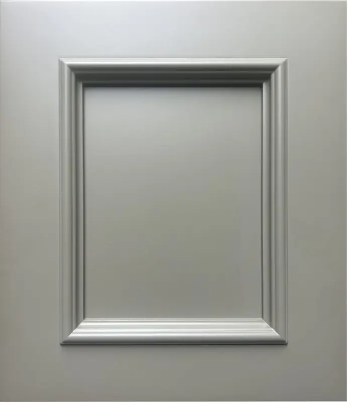 Close-up detail of applied moulding trim on a cabinet door