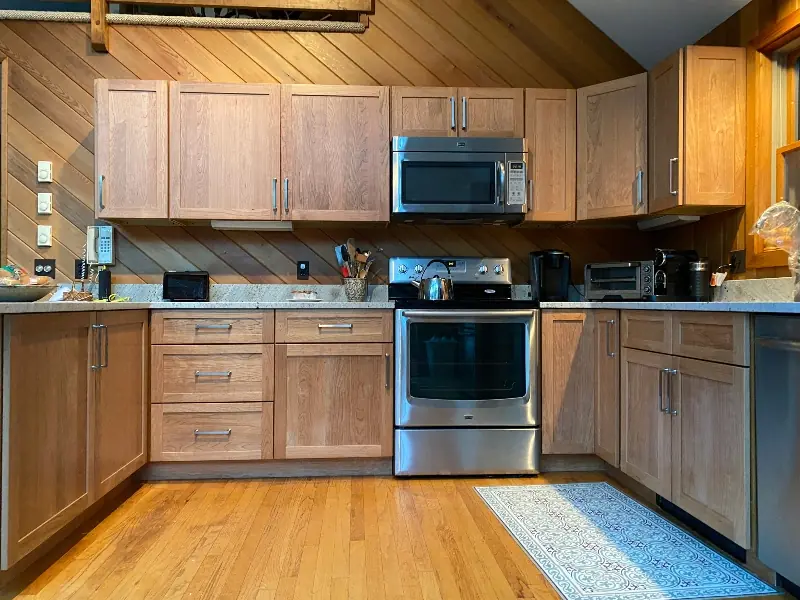 Full kitchen remodel with new layout, custom cabinets, and countertops — Western Massachusetts