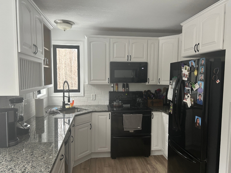 Maple kitchen cabinets after professional spray painting