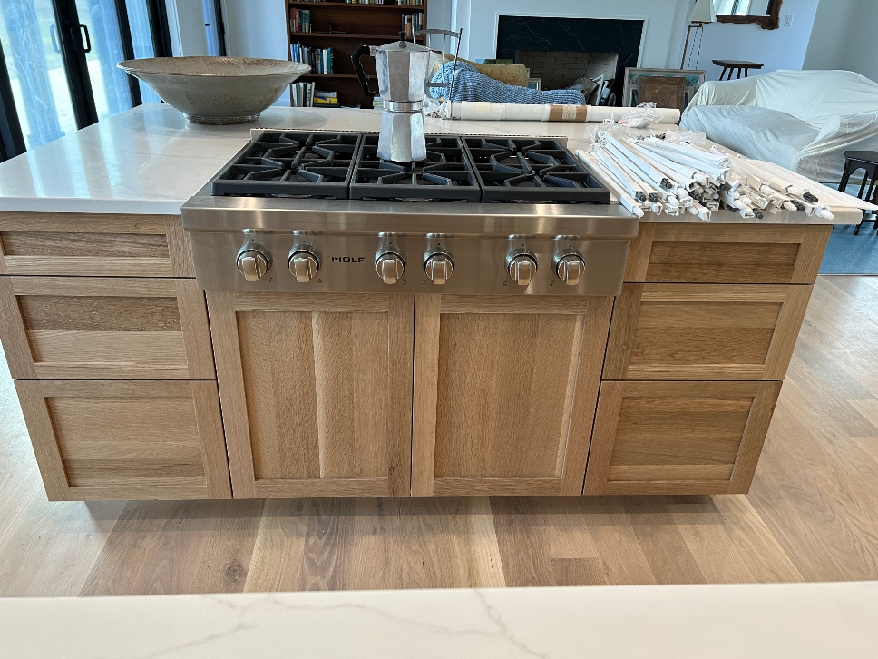 Natural white oak kitchen island in custom remodel