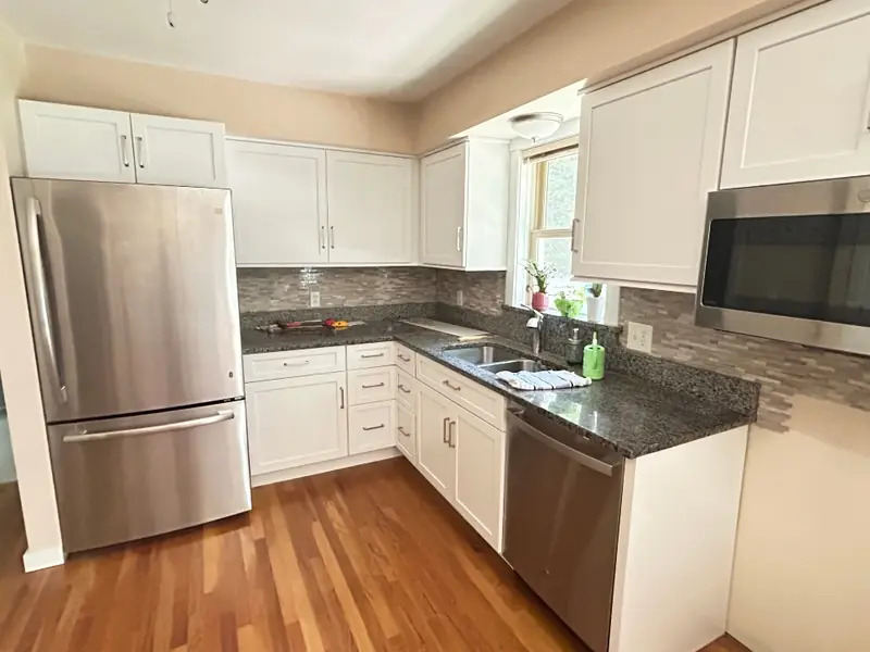 Fresh painted cabinet refacing transformation completed in Stafford CT