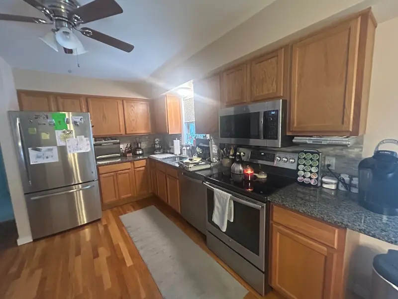 Worn painted cabinets before cabinet refacing in Stafford Connecticut