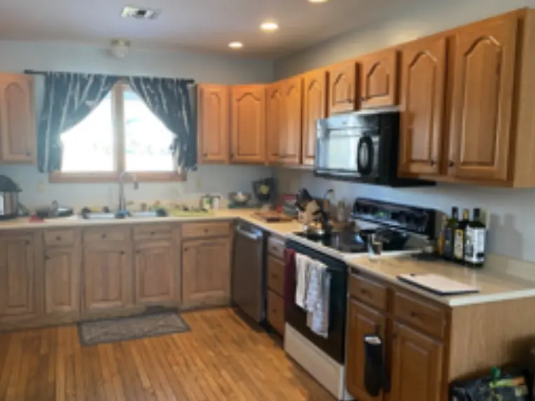Dated honey oak kitchen cabinets before updating — Homestead Cabinet Design Palmer MA
