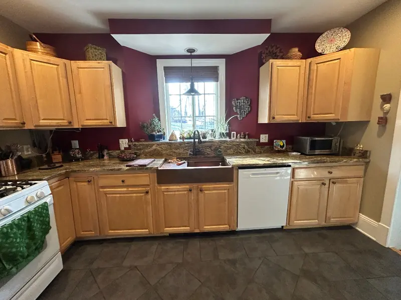 Old kitchen cabinets before rustic white oak refacing in Pittsfield MA