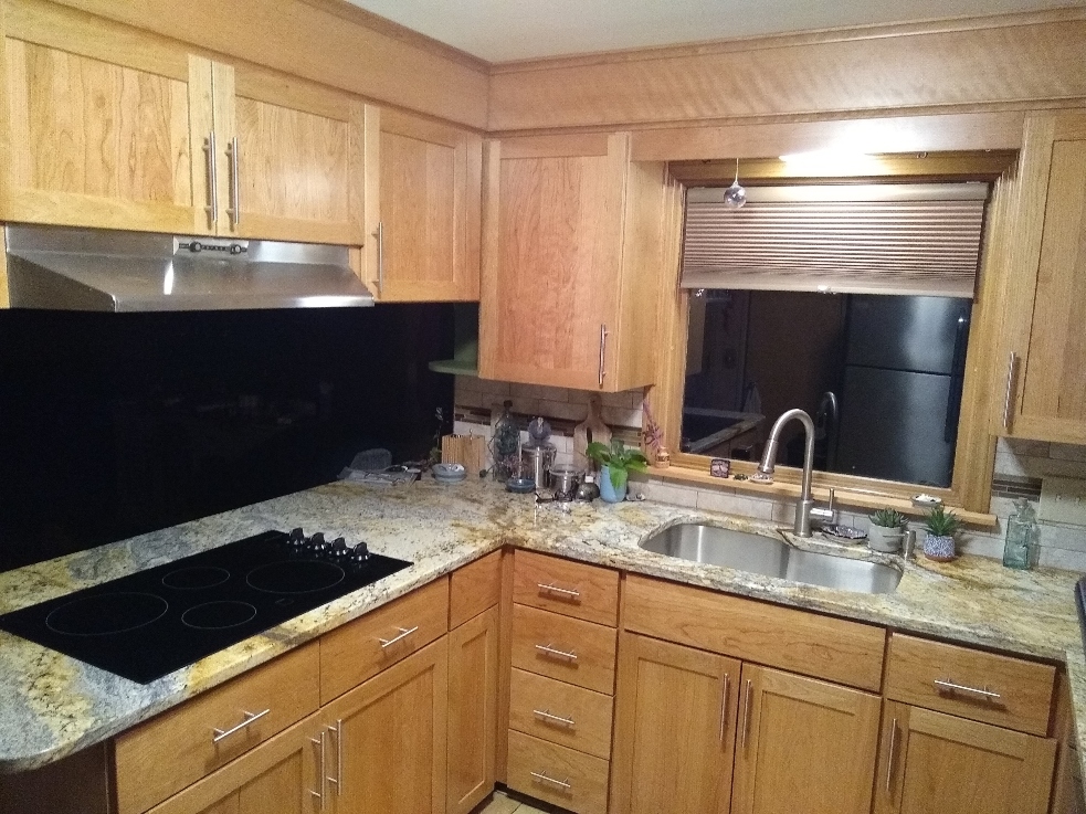 White shaker cabinet refacing completed in Longmeadow MA with updated hardware