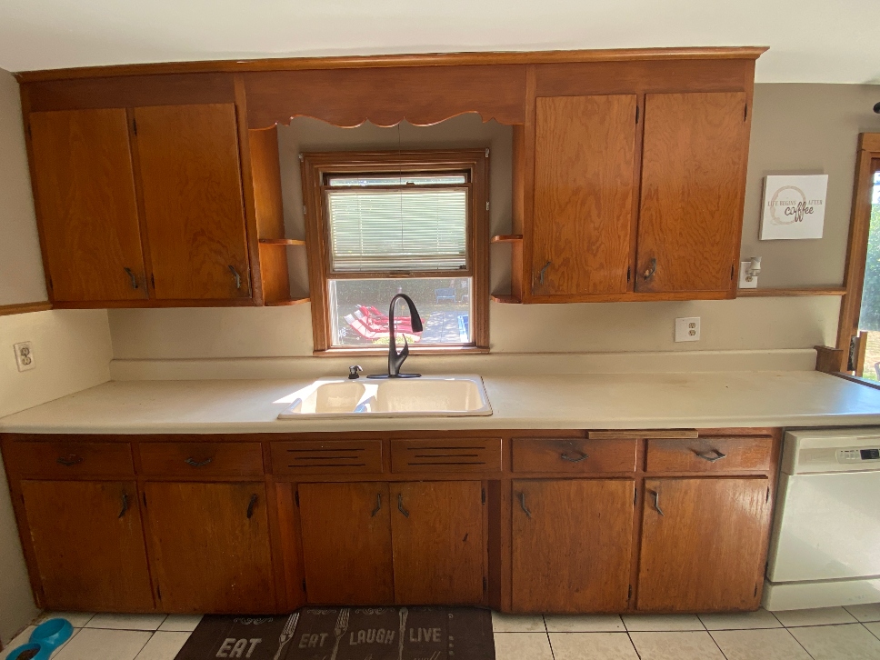 Springfield MA kitchen before cabinet refacing — worn oak cabinet boxes