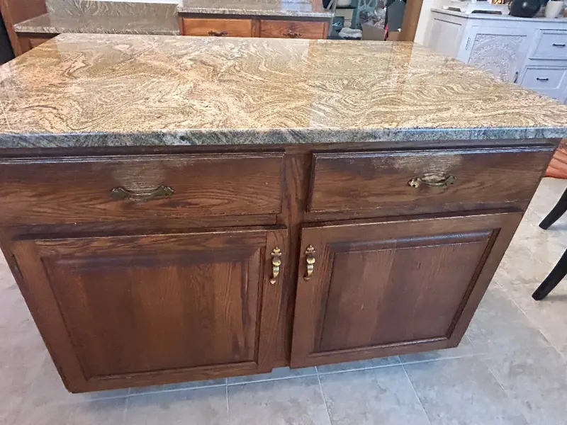 Cabinet with water-damaged, discolored wood that complicates refinishing — Homestead Cabinet Design Palmer MA