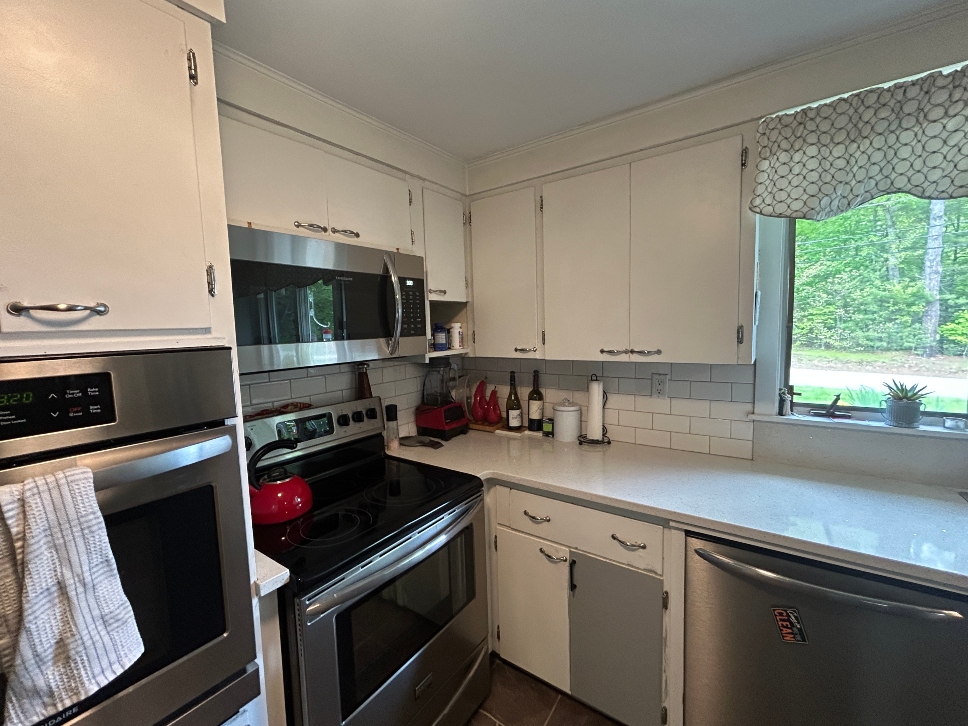 Dated kitchen cabinets before refacing project in West Brookfield MA