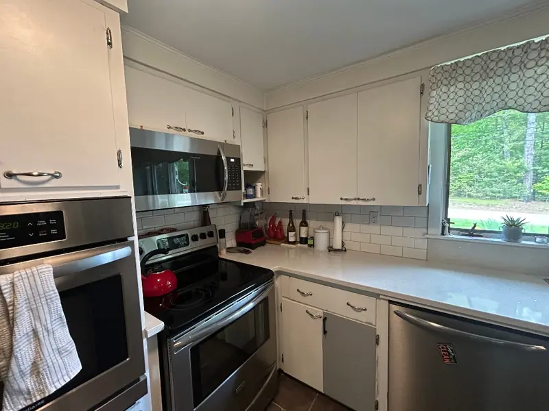 Dated kitchen cabinets before refacing project in West Brookfield MA